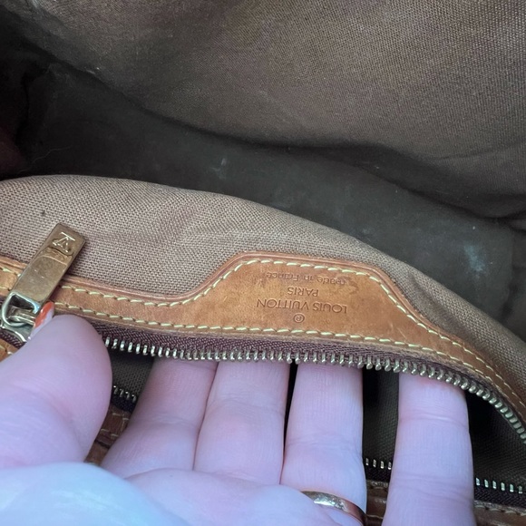 Authentic Louis Vuitton tote. One side of the Strap is loose but an easy fix. - Picture 3 of 3